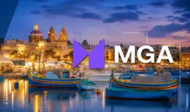 MGA-logotyp framför hamn på Malta